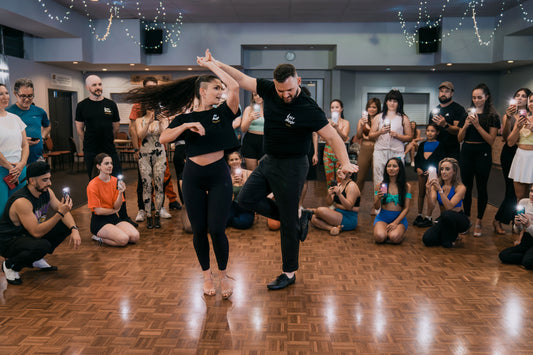Alex and Madalyn dancing at LocoMojo at the Polish club while students record